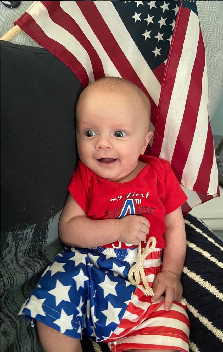 Adoption Circle - adoptive baby in 4th of July gear