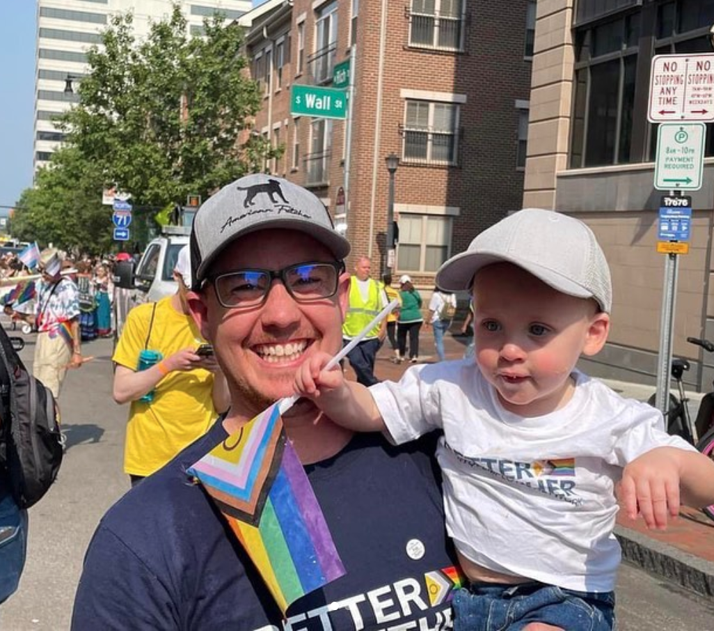 picture of baby and dad at pride parade